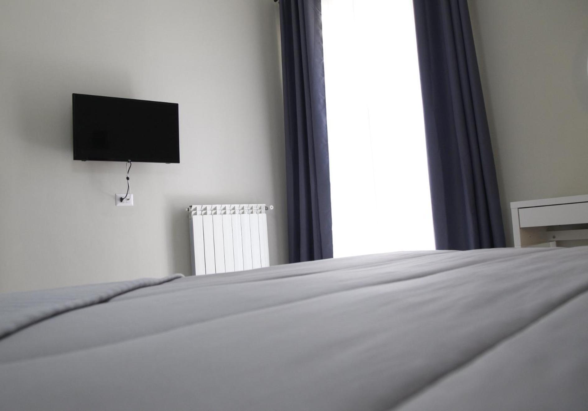 Grey Apartment Caiazzo Luaran gambar